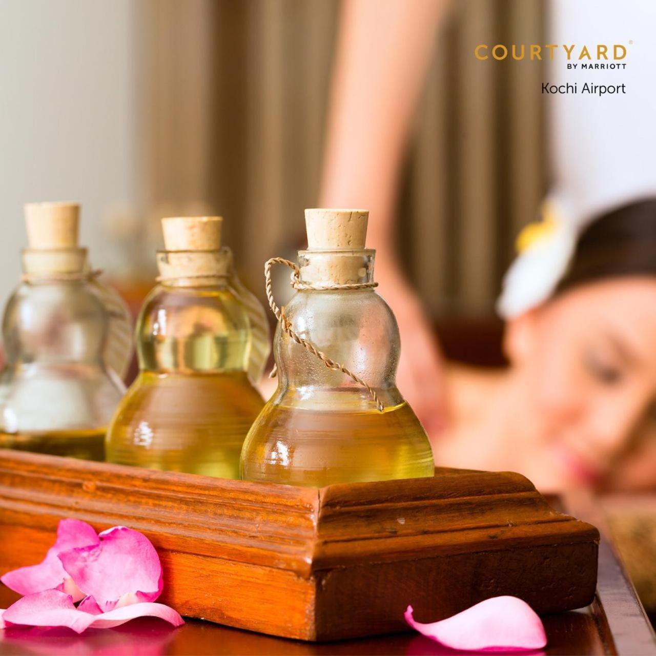 Отель Courtyard By Marriott Kochi Airport Недумбассери Экстерьер фото Ayurvedic massage