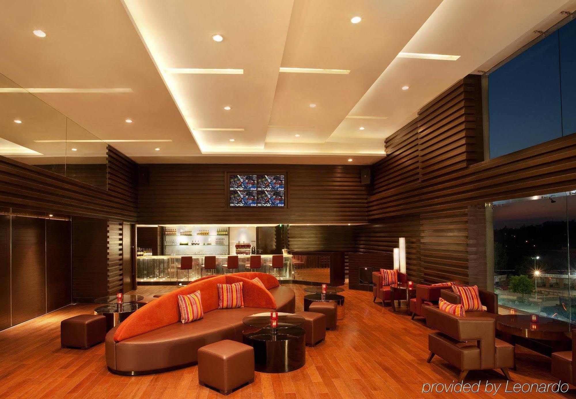 Отель Courtyard By Marriott Kochi Airport Недумбассери Экстерьер фото The lounge at the airport